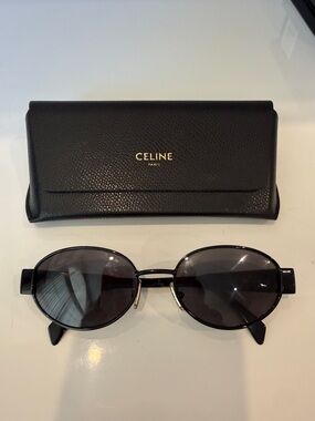 CELINE
Triomphe round sunglasses